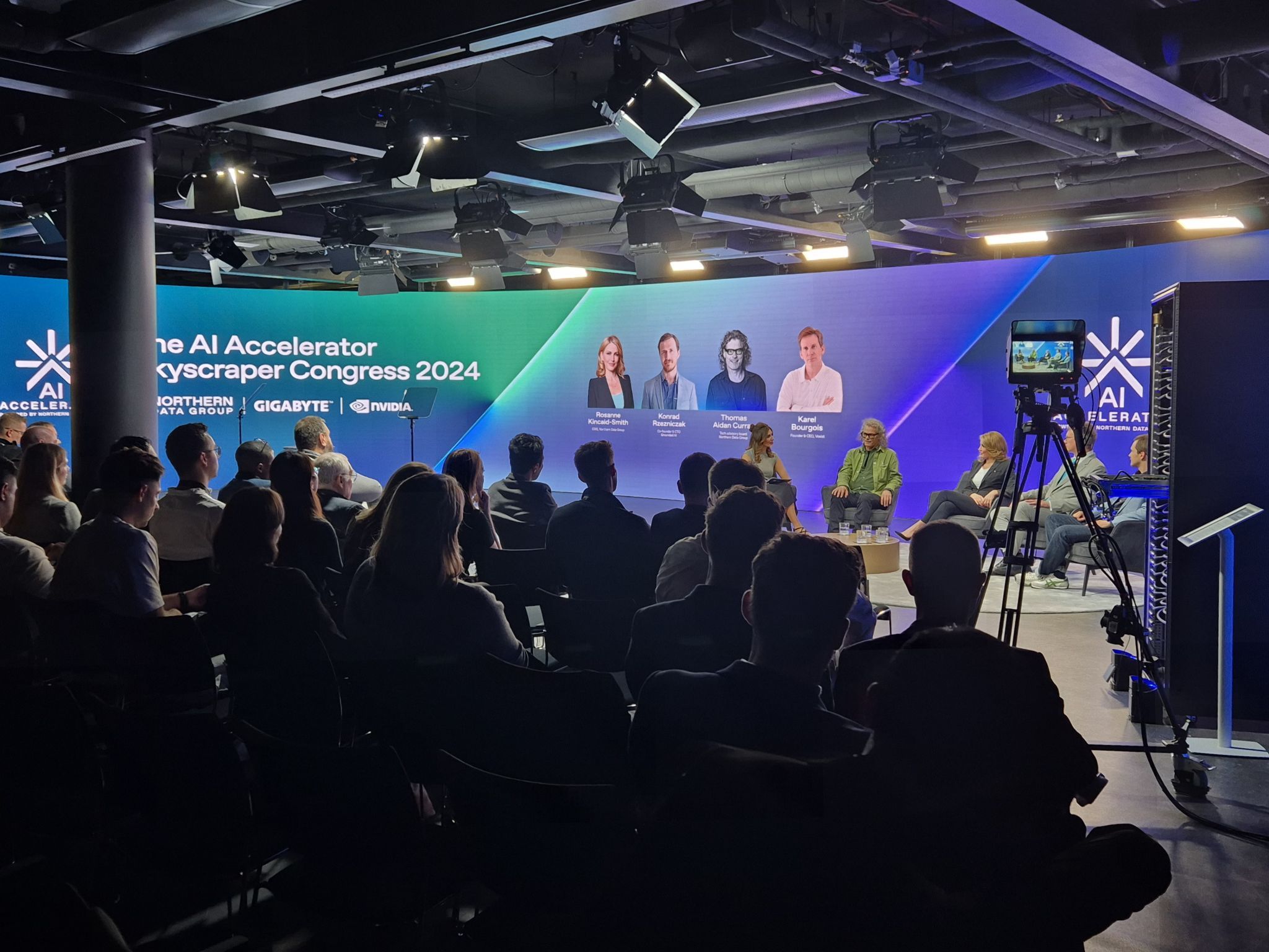 Panel discussion captured live from the audience floor.
