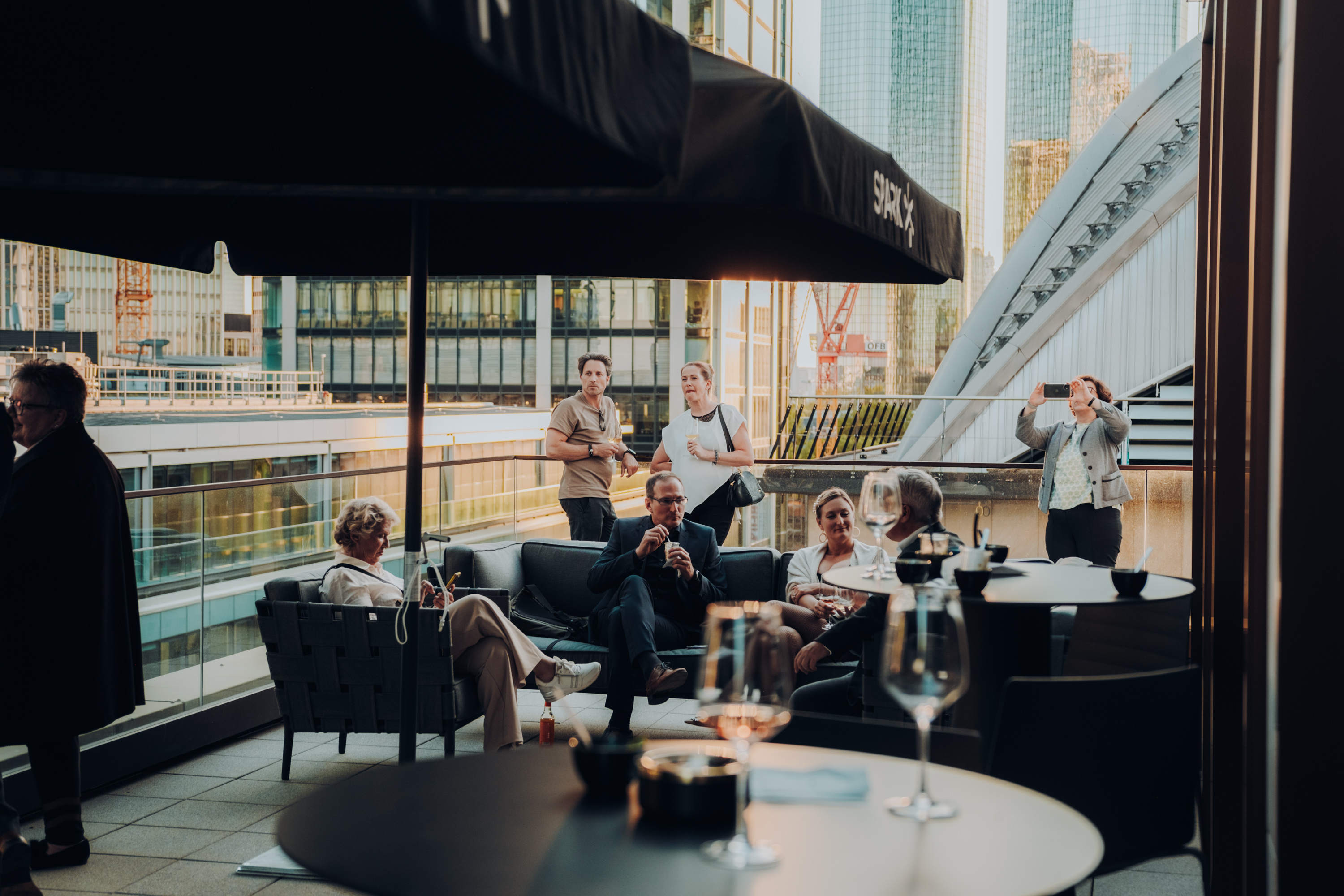 Summerfest on the Junghof Plaza terrace with food stations and a long bar.